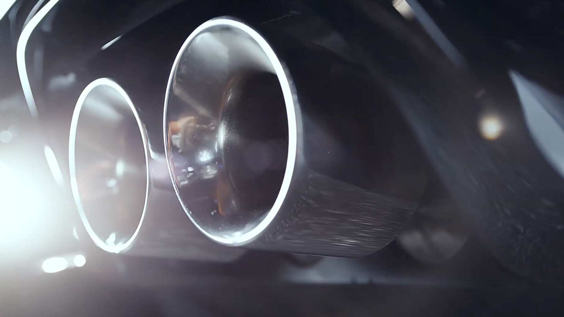 Close up of a Jaguar F-type dual Exhaust pipe.